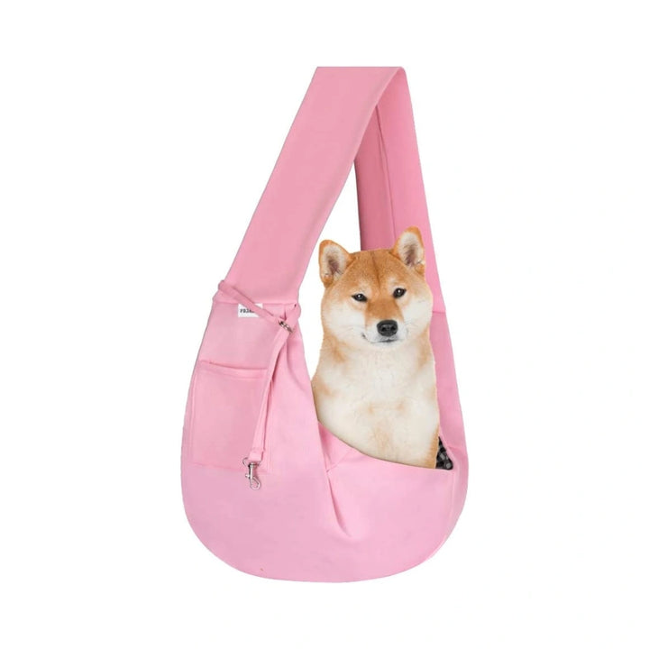 PawsApproved- Pink Dog Sling Carrier with a dog inside